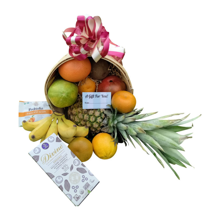 Organic tropical fruit box filled with exotic fresh fruits
