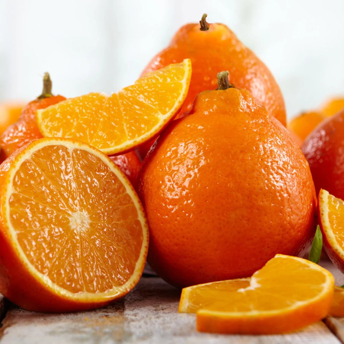 Fresh organic oranges in holiday gift box