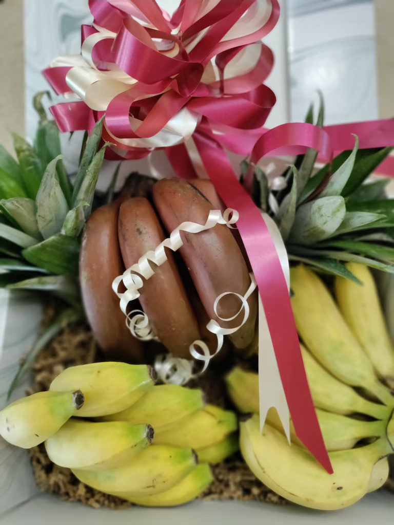Variety of organic bananas including apple and Thai bananas